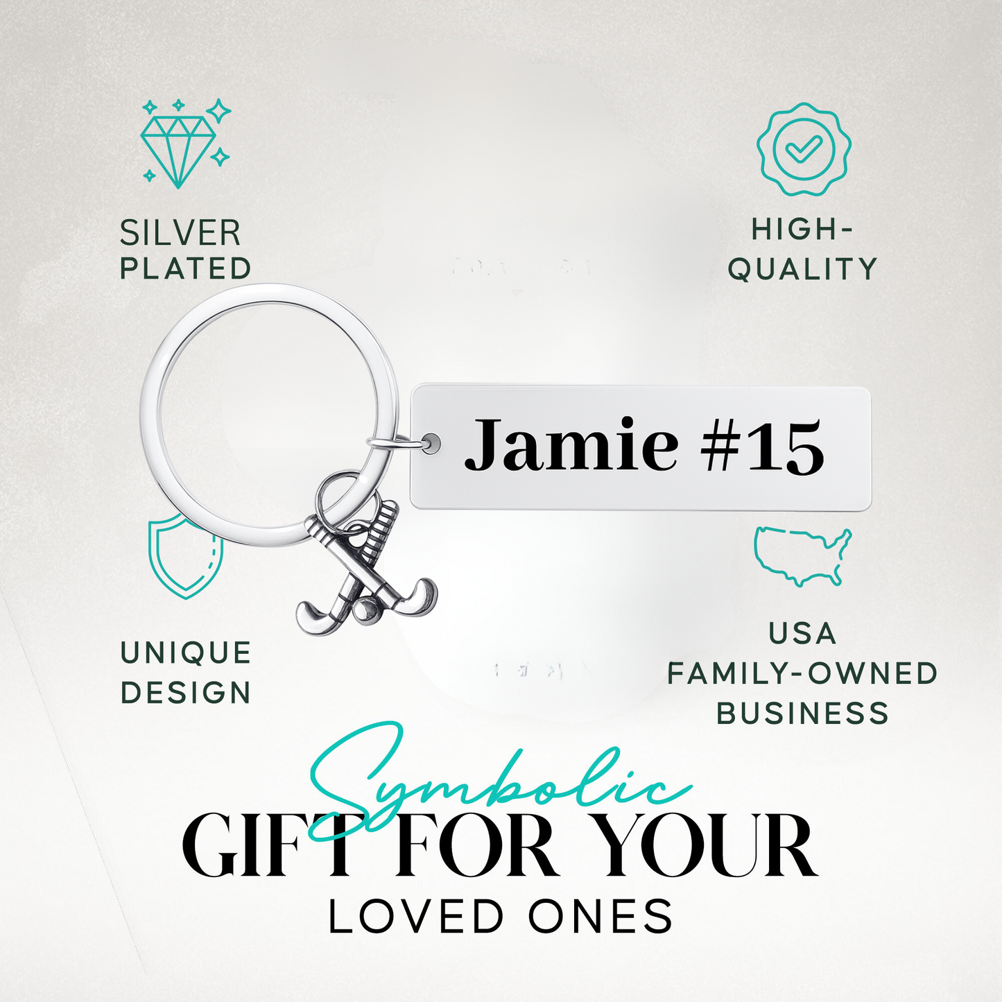 Engraved stainless steel bar keychain with field hockey charm in gift-ready packaging