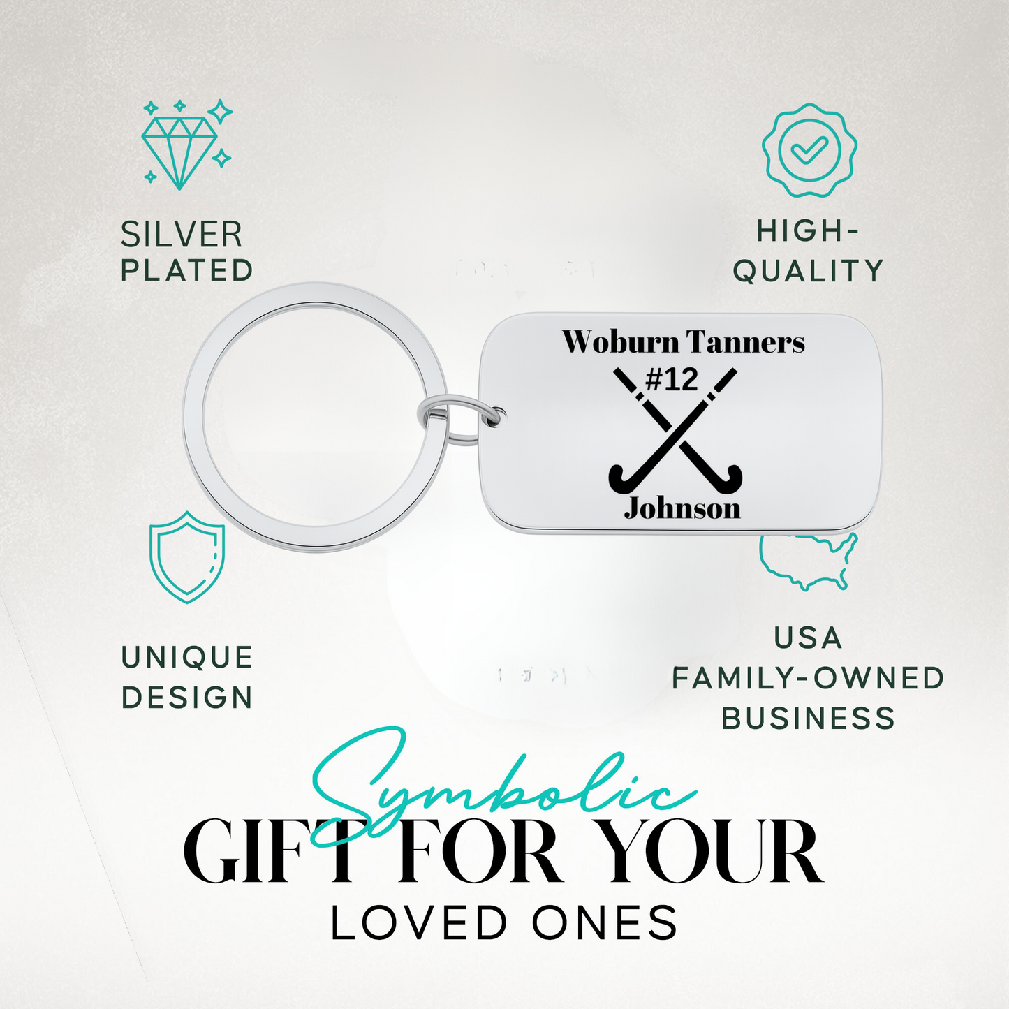 Field hockey engraved dog tag keychain with text highlighting durable stainless steel and perfect gift idea