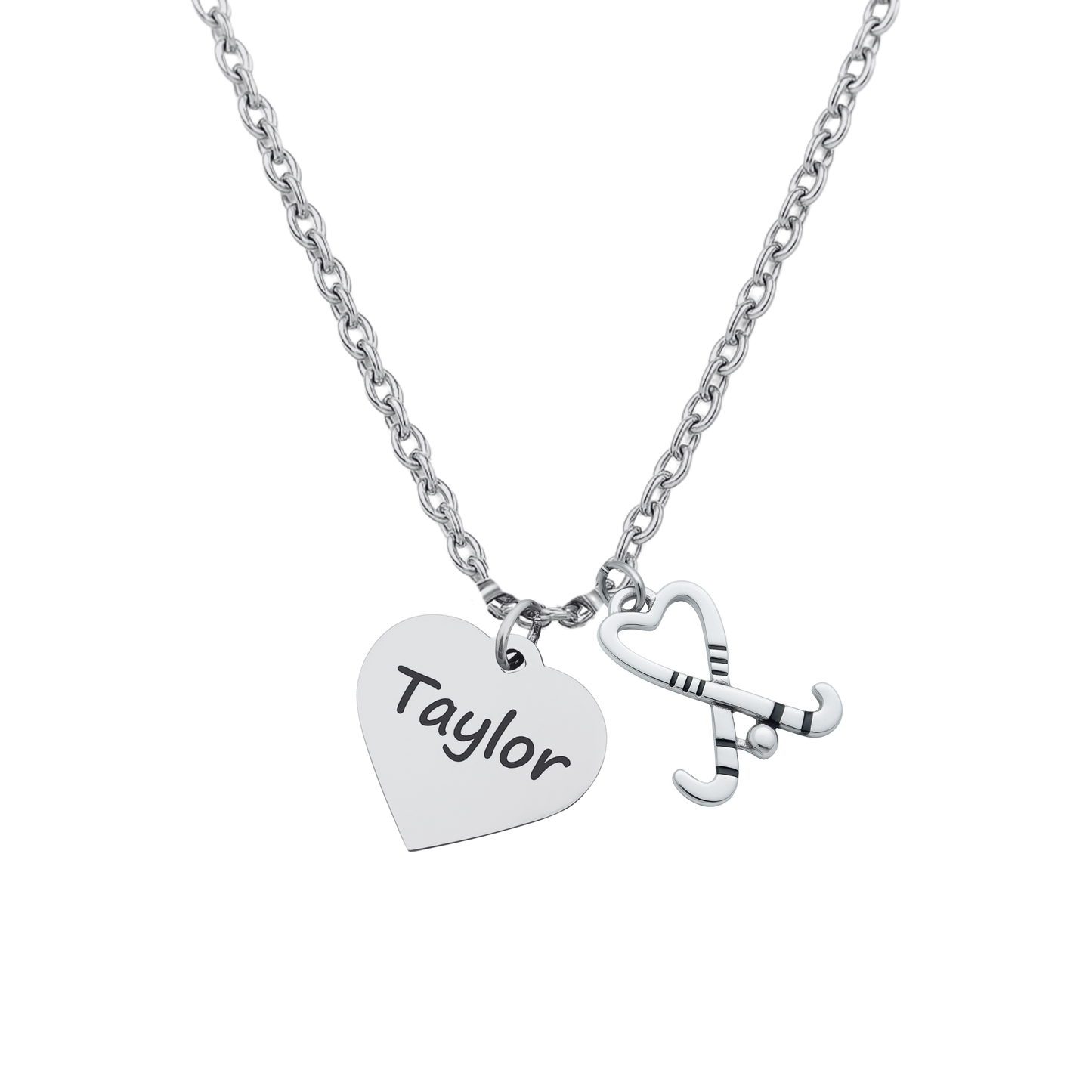 Close-up of personalized field hockey necklace with engraved name and stick charm