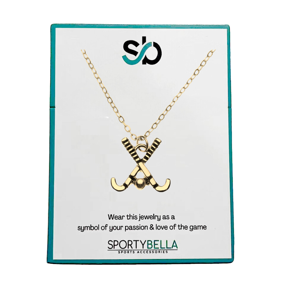 Elegant gold field hockey charm necklace displayed on gift-ready card – perfect team or coach gift