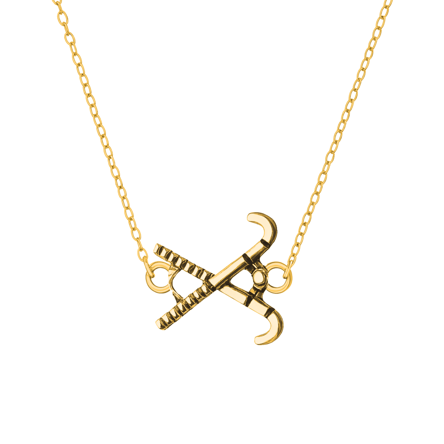 Gold-tone field hockey pendant necklace with stick and ball charm on white background
