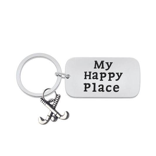 Silver dog tag style field hockey keychain engraved with My Happy Place charm on white background