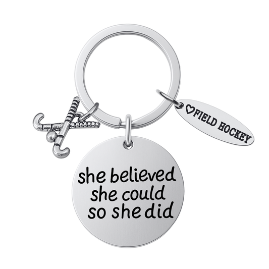 Silver plated field hockey keychain with crossed sticks charm, Field Hockey charm, and engraved She Believed She Could So She Did pendant