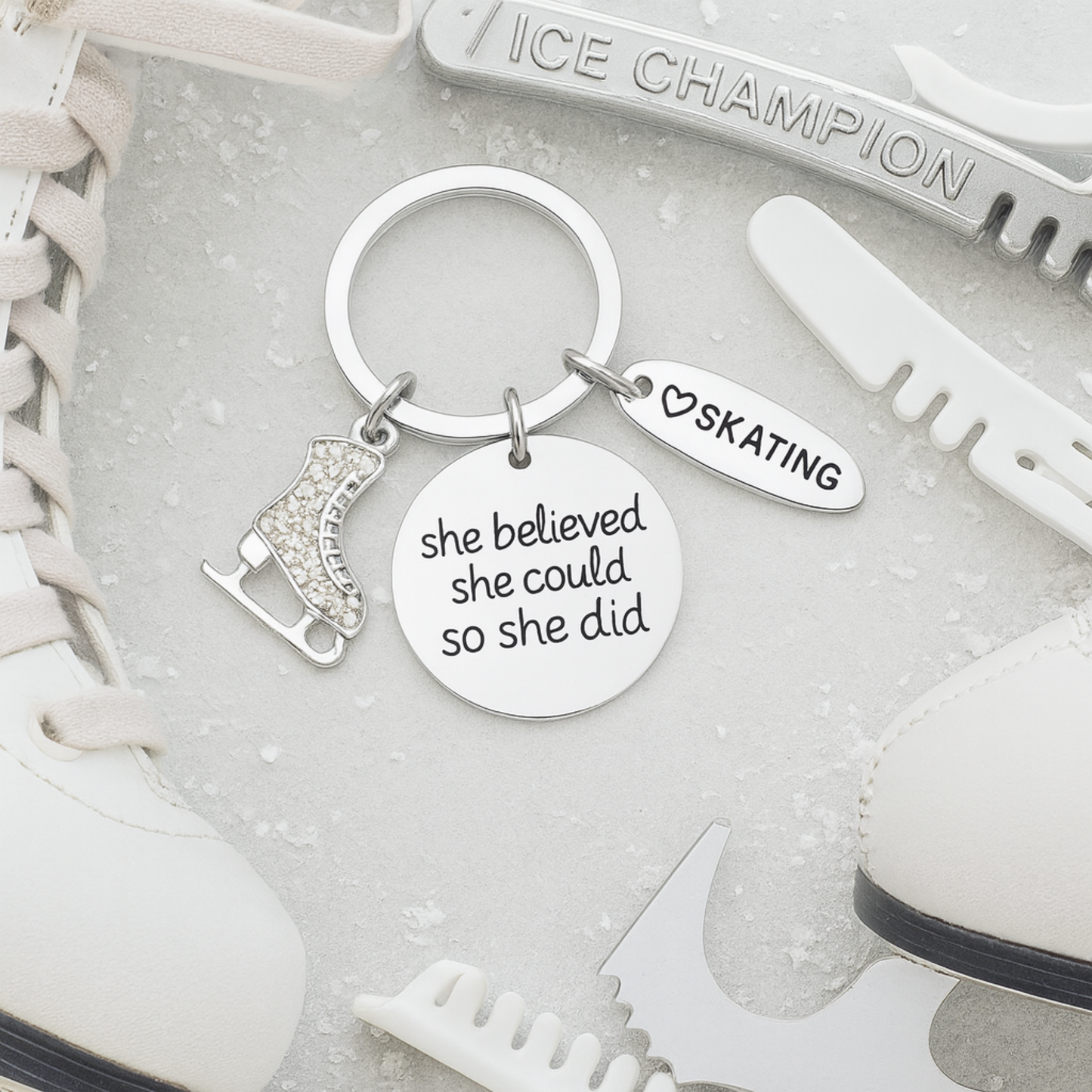 Figure skater charm keychain with motivational engraved disc and 'Skating' tag