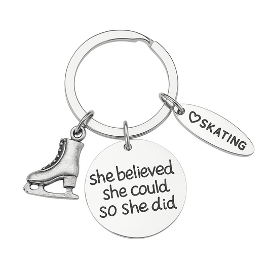 Figure skating keychain with silver skate charm and engraved 'She Believed She Could So She Did' pendant