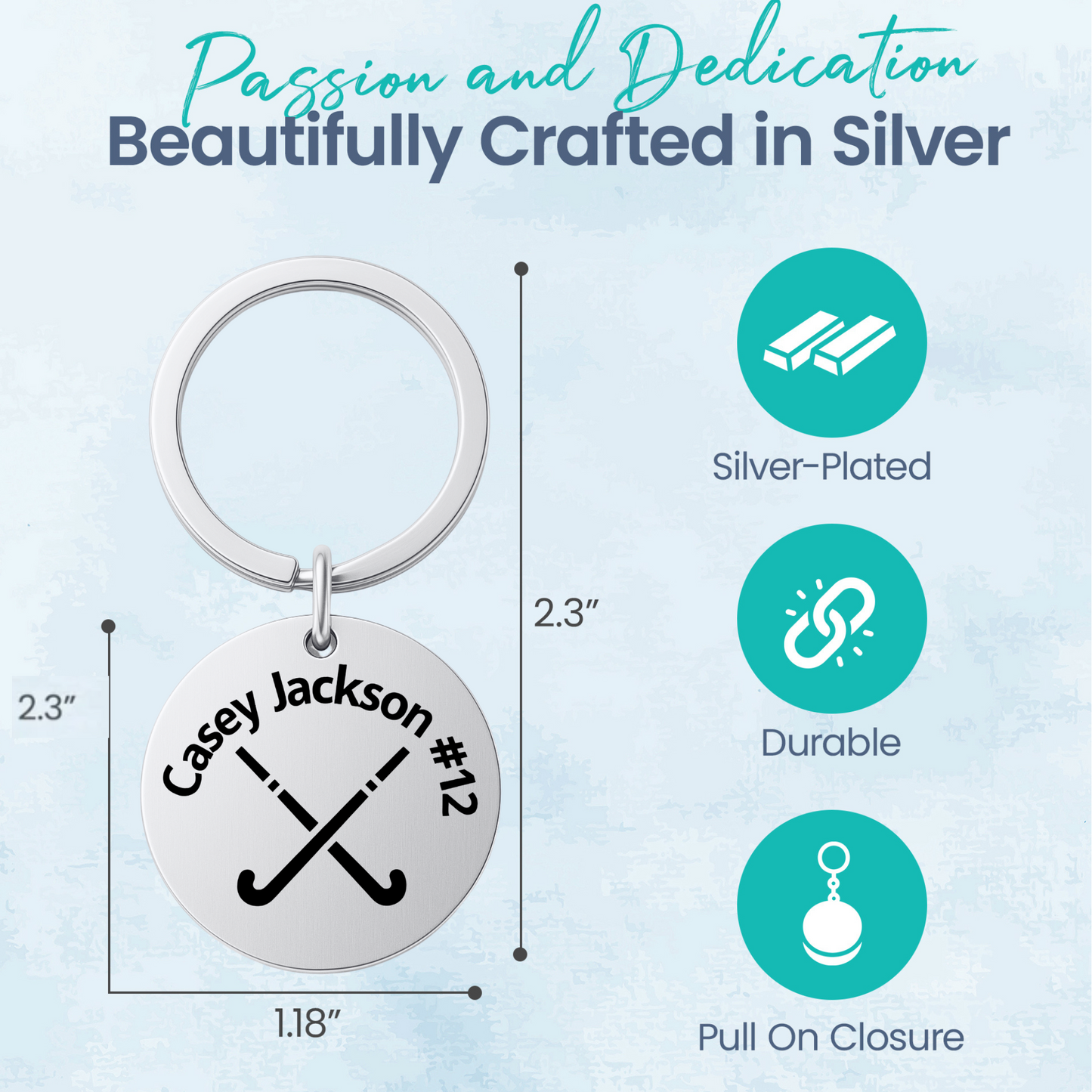Custom name field hockey keychain with crossed sticks design displayed on silver product card