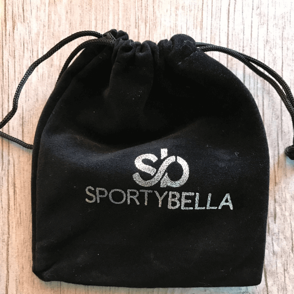 Black velvet pouch with SportybElla logo, perfect for storing jewelry or accessories.