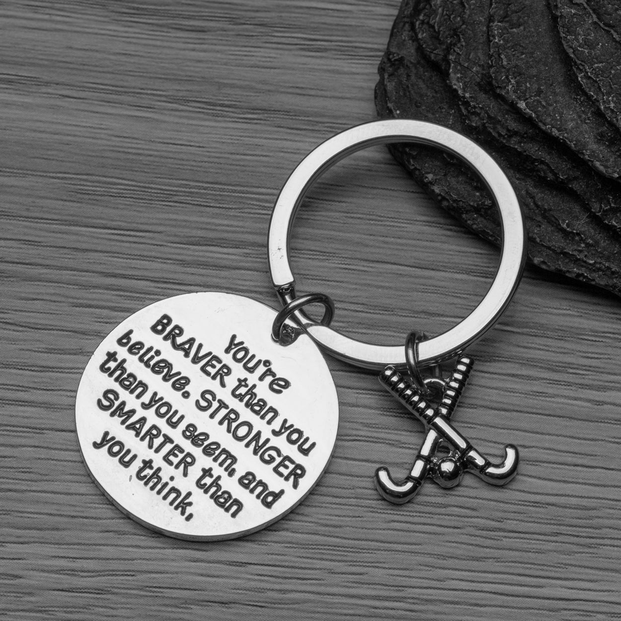 Silver motivational field hockey keychain with engraved message for girls, players, and coaches