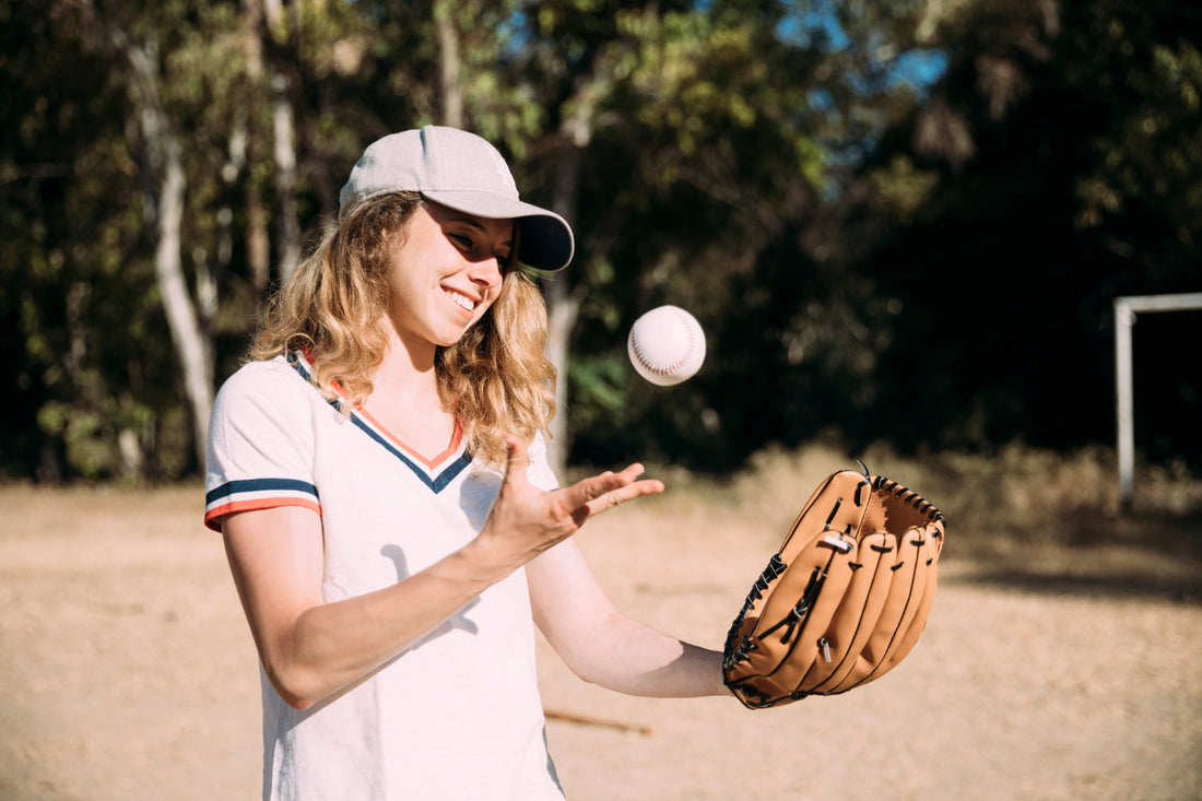 girl playing softball