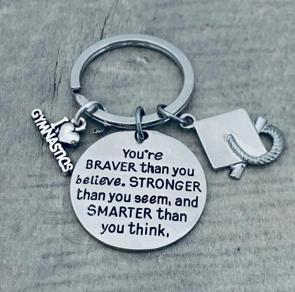 Keychain with gymnastics and graduation charms