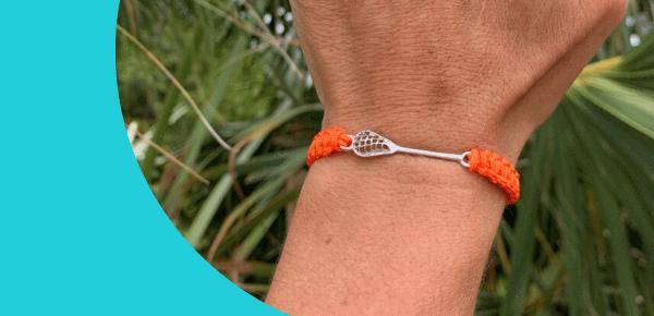 Customizable lacrosse bracelet with charms