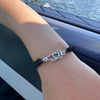 Lifestyle image of cheer bracelet being worn on wrist