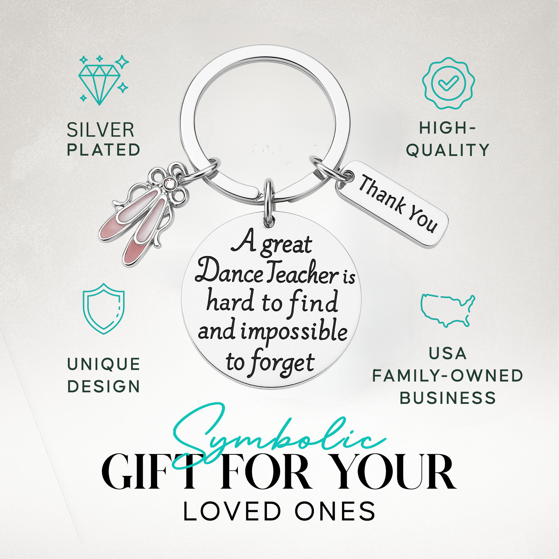 Close-up of keychain on textured fabric background with ballet slipper charm