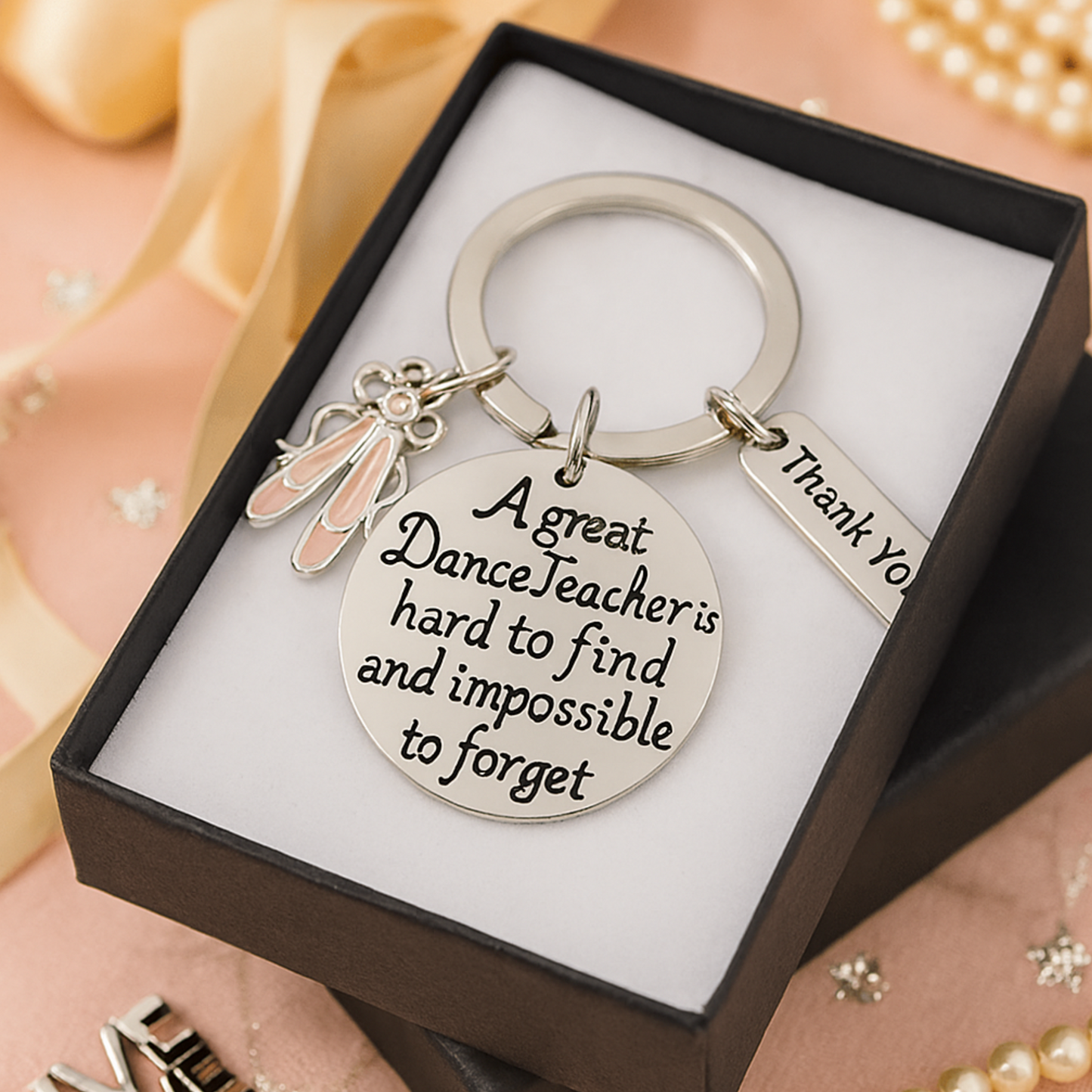 Ballet dance teacher keychain displayed in elegant gift box with engraved message
