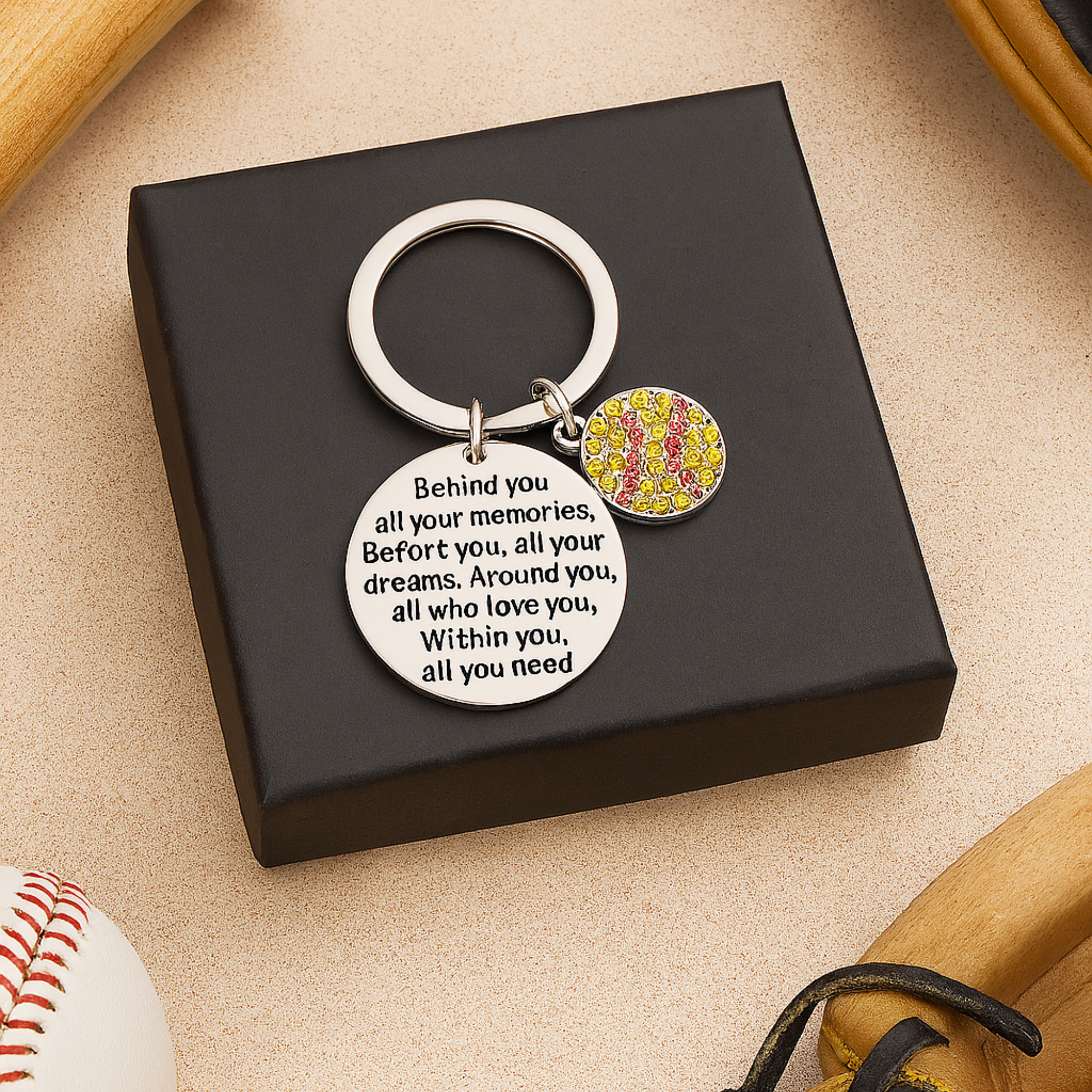 Gift-ready baseball keychain in black box with charm facing up, ready for gifting