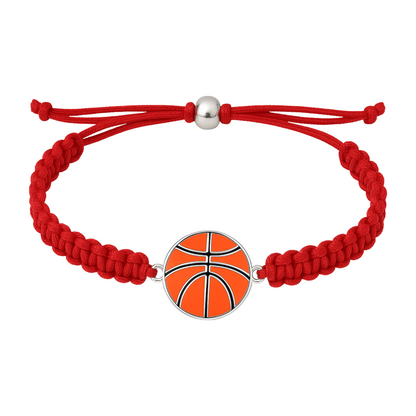 Red rope bracelet with shiny basketball charm centered on white background