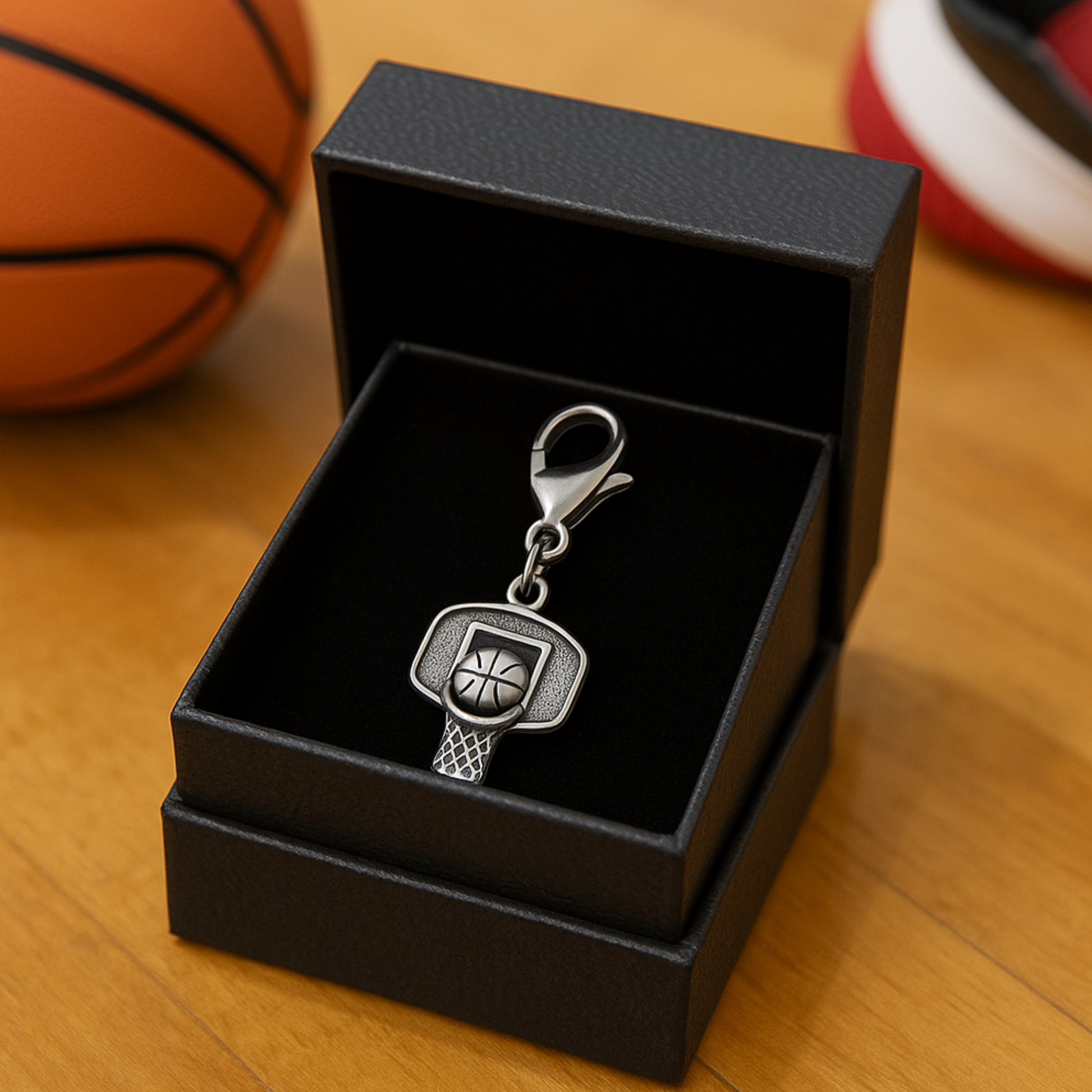 Basketball zipper pull photographed in gift box with natural court background