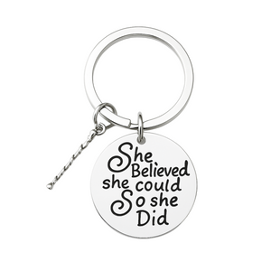  Stainless steel keychain with engraved “She Believed She Could So She Did” twirling charm