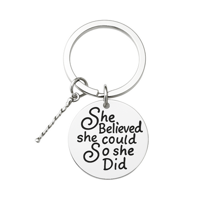  Stainless steel keychain with engraved “She Believed She Could So She Did” twirling charm