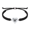 Black bracelet with XC engraved charm and adjustable knot