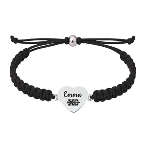 Black bracelet with “XC” charm
