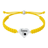 Yellow bracelet featuring heart charm engraved with bowling pins and custom text