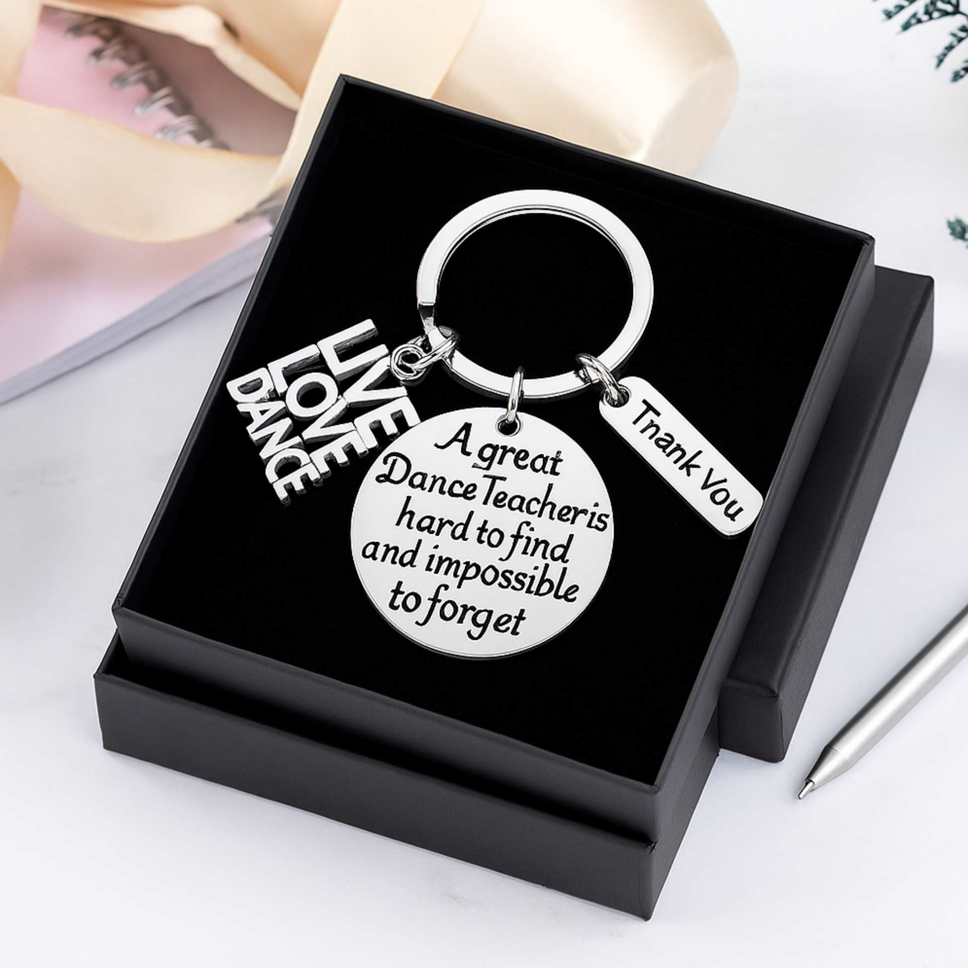 Inspirational dance teacher keychain displayed in a black gift box with “Thank You” charm