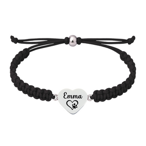 Black rope bracelet featuring heart-shaped charm engraved