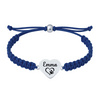 Blue braided rope bracelet with stainless steel heart charm engraved with “Emma” and paw print icon
