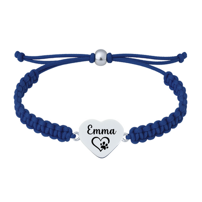 Blue braided rope bracelet with stainless steel heart charm engraved with “Emma” and paw print icon