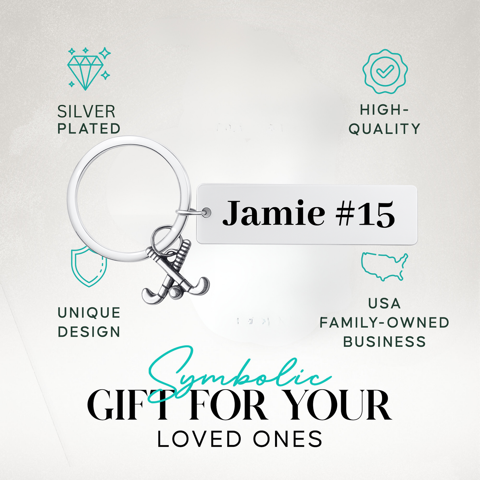 Engraved stainless steel bar keychain with field hockey charm in gift-ready packaging