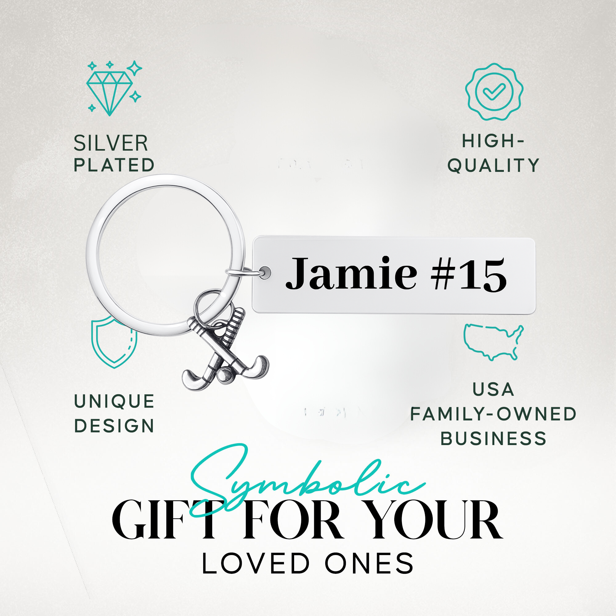Engraved stainless steel bar keychain with field hockey charm in gift-ready packaging