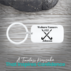 Stainless steel field hockey dog tag keychain with crossed sticks and personalized engraving on rustic wood