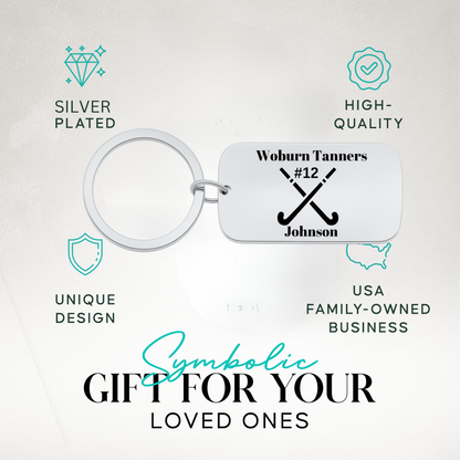Field hockey engraved dog tag keychain with text highlighting durable stainless steel and perfect gift idea
