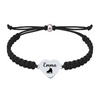 Black adjustable bracelet with custom engraved heart charm for figure skaters