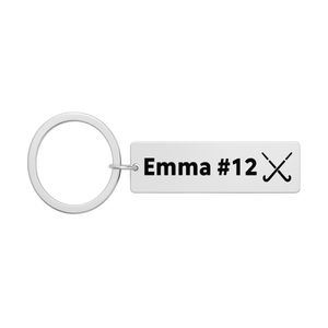 Stainless steel engraved field hockey bar keychain with crossed sticks design and custom name and number