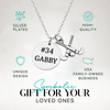 Personalized field hockey necklace in gift box with custom engraved disc and stick charm