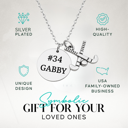 Personalized field hockey necklace in gift box with custom engraved disc and stick charm