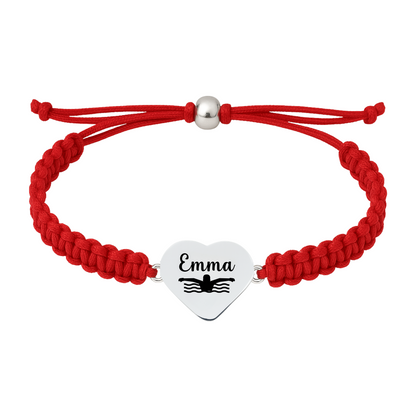 Red swim bracelet with heart-shaped swimmer charm