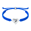 Royal blue bracelet with engraved heart charm showing track symbol