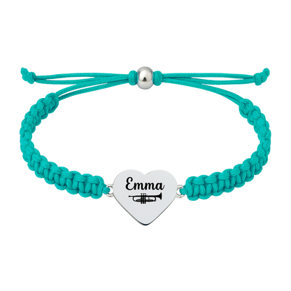 Teal braided rope bracelet with stainless steel heart charm engraved with “Emma” and a trumpet icon