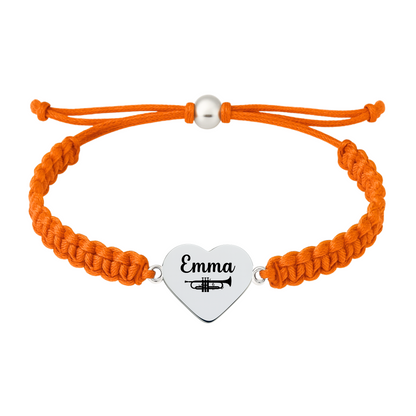 Orange bracelet with stainless steel heart charm engraved with trumpet icon