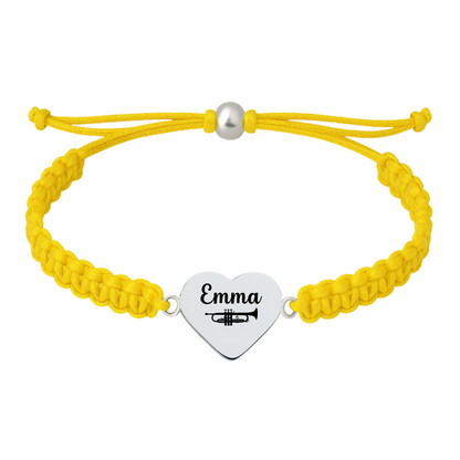 Yellow bracelet featuring personalized trumpet heart charm