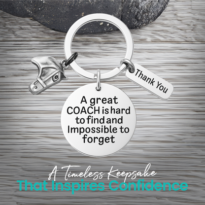 Silver equestrian coach keychain with horse head charm and engraved Great Coach Is Hard to Find pendant on rustic wood