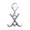 Silver field hockey clip-on zipper pull charm with crossed sticks and ball design and lobster clasp attachment