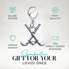 Silver field hockey zipper pull charm shown with text about unique design, durability, and gift idea
