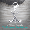 Silver field hockey zipper pull charm shown with text about unique design, durability, and gift idea