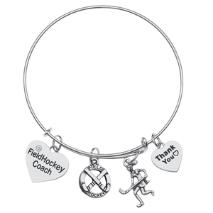 Silver plated field hockey coach bangle bracelet with engraved charms on white background