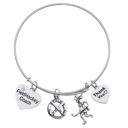 Silver plated field hockey coach bangle bracelet with engraved charms on white background