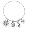 Adjustable silver field hockey coach bangle bracelet with three charms including stick and player